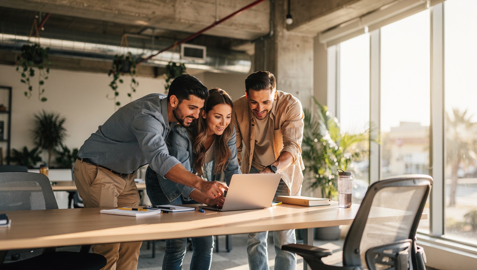 Startup founders reviewing group health insurance options for their new business